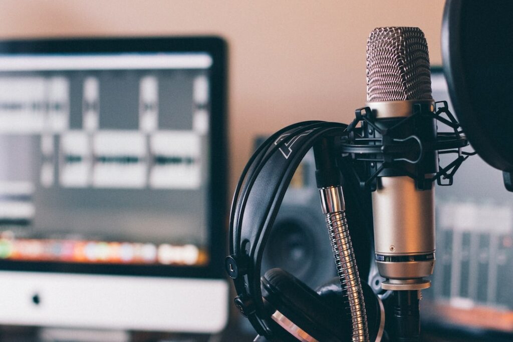 closeup photo of a studio mic and headphone